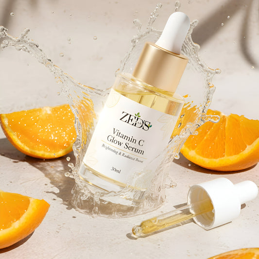 ZEDS Vitamin C Glow Serum with orange slices on a light background