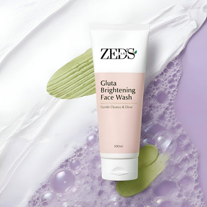 ZEEs Gluta Brightening Face Wash tube on a textured background
