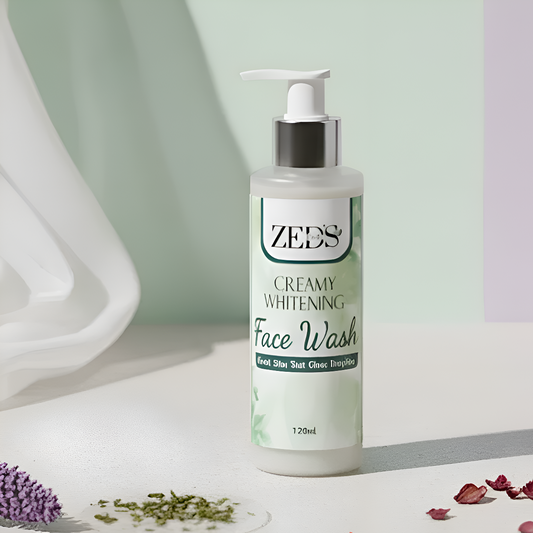 ZEDS Creamy Whitening Face Wash bottle on a white surface with decorative elements.